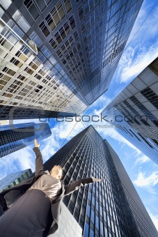 Businesswoman Arms Up in Modern City Office Skyscrapers