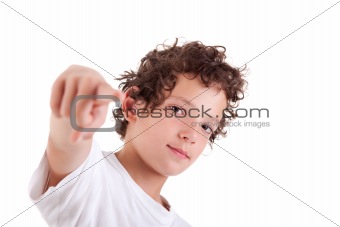 Cute Boy pointing, isolated on white, studio shot