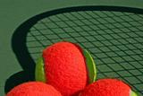 Tennis balls and shadow racket