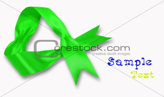 green ribbon with bow on a white background 
