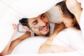 Young couple in bed
