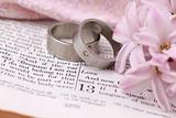 Bible and wedding rings