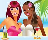 Two beautiful women with cocktails on the beach