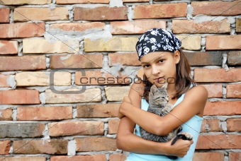 Teenage girl portrait with cat
