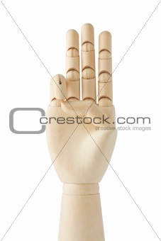 wooden dummy hand with three fingers up