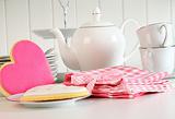 Heart-shape valentine cookies with teapot and cups