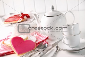 Valentine cookies with teapot and cups