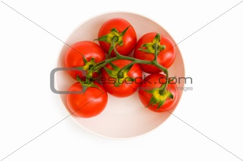Red tomatoes isolated on the white background