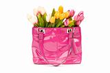 Bag and flowers isolated on the white background