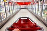 Fast Food Concept Motion Blur Shopping Trolley in Supermarket