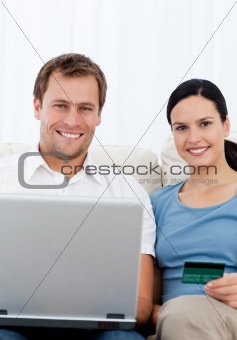 Lovely couple buying online