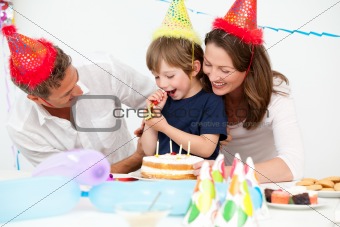 Happy parents celebrating their son's birthday