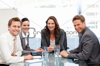 Portrait of a businesswoman with her team