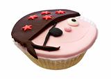 Cupcake with pirate face isolated over white