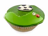 Cupcake with soccer bal isolated over white
