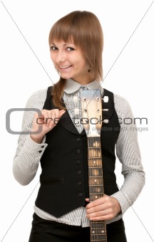 Young girl with guitar in hand