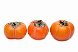 Three persimmons put in row