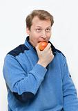 Man eats apple