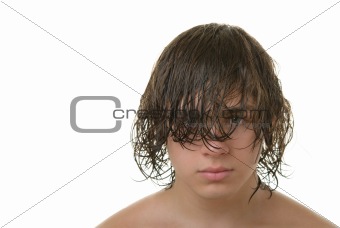 Teenager with long wet hair it