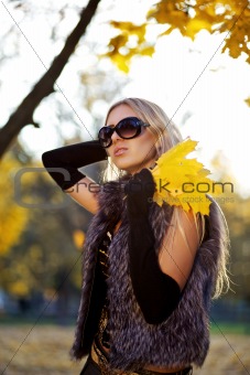 beautiful woman portrait in natural autumn