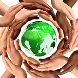 Multiracial Hands Around the Earth Globe