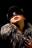 woman with fur and sunglasses
