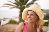 Portrait of young sexy romantic summer woman in large hat