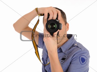professional male photographer taking picture . isolated