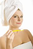 Young beautiful woman with healthy strong teeth and white towel 