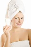 Young beautiful healthy woman with white towel on her head