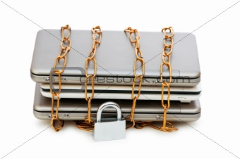 Concept of computer security with laptop and chain