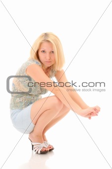 Pretty blonde squatting