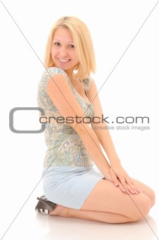 Cute smiling blonde sitting