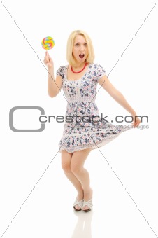 Attractive surprised  blonde with lollipop