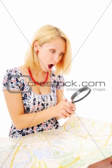 Attractive young blonde found something on the map
