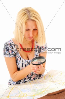 Attractive young blonde studying map