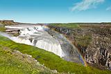 Gullfoss waterfall under a beautiful rainbow