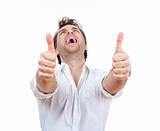excited man laughing holding his both thumbs up - isolated on white