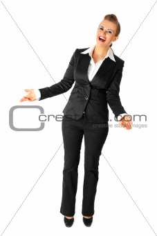 Full length portrait of laughing modern business woman
