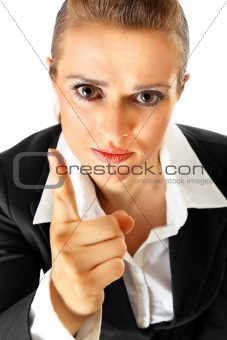 Strict modern business woman shaking her finger
