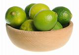 Wooden bowl filled with limes