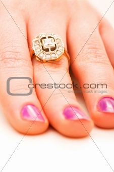 Hand with golden ring isolated on the white