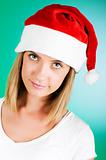 Girl with santa hat against gradient background