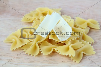 Italian pasta on a wooden board wish
