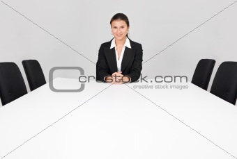 Businesswoman sitting alone