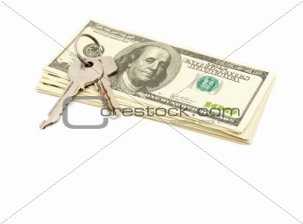 keys and stack of dollars