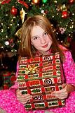 Child with Christmas present