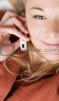 Businesswoman working using mobile phone.