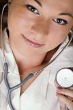 Smiling young doctor with stethoscope