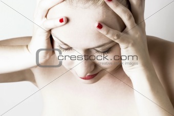 Beautiful woman with headache